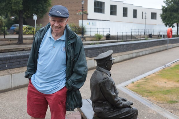 Frank Dowling in front of a statue of Captain Mainwaring, from Dad's Army