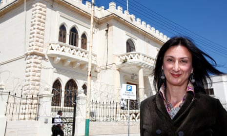 Daphne Caruana Galizia outside the Libyan embassy in Valletta, Malta, in 2011. Organised crime, particularly oil smuggling from Libya, was a frequent subject for her investigations. 