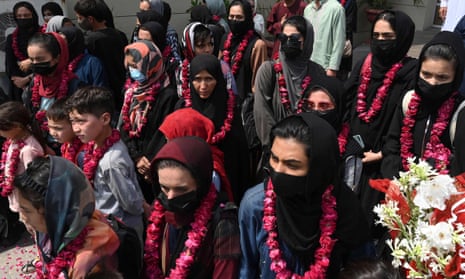 Female footballers from Afghanistan and family members arrive at the Pakistan football federation’s headquarters in Lahore on Wednesday.