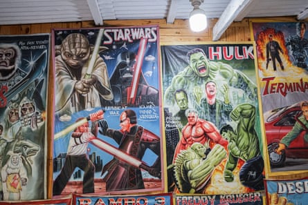 Hand-painted film posters at the Centre for National Culture, including Star Wars and Hulk