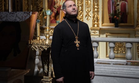 Father Ivan in his church
