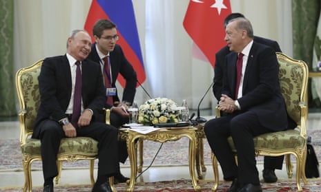 Recep Tayyip Erdoğan, right, talks with Vladimir Putin, in Tehran.