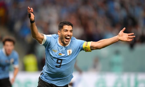 Luis Suarez celebrates after his teammate Giorgian de Arrascaeta opens the scoring for Uruguay!