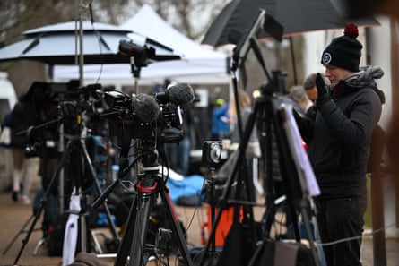 Journalists waiting outside Buckingham Palace on Thursday.