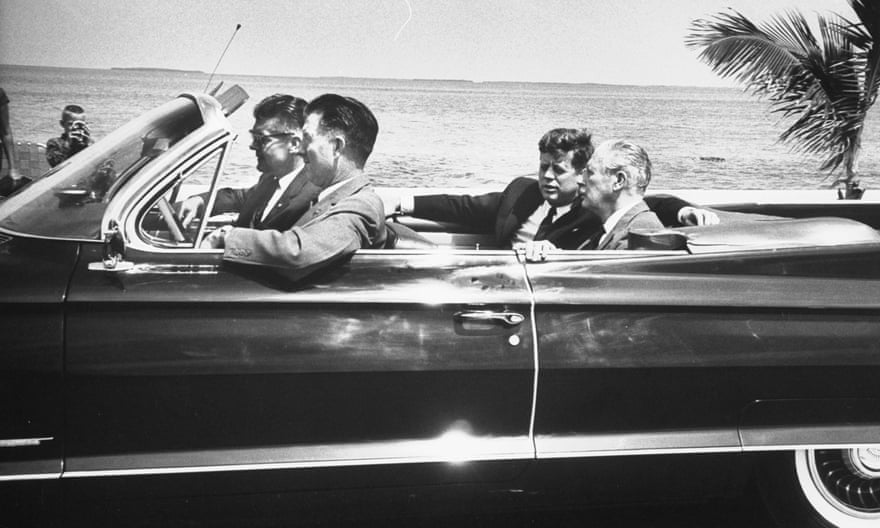 John F Kennedy (rear of car, left) with Harold Macmillan in Florida in 1961.