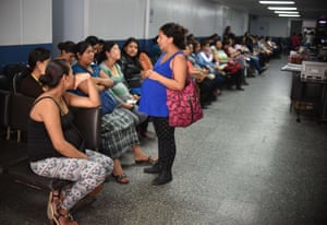 Pregnant women wait to be seen by health officials at the maternity unit of the Guatemalan Social Security Institute (IGSS)