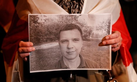 Person holds photo of Andrei Zeltser