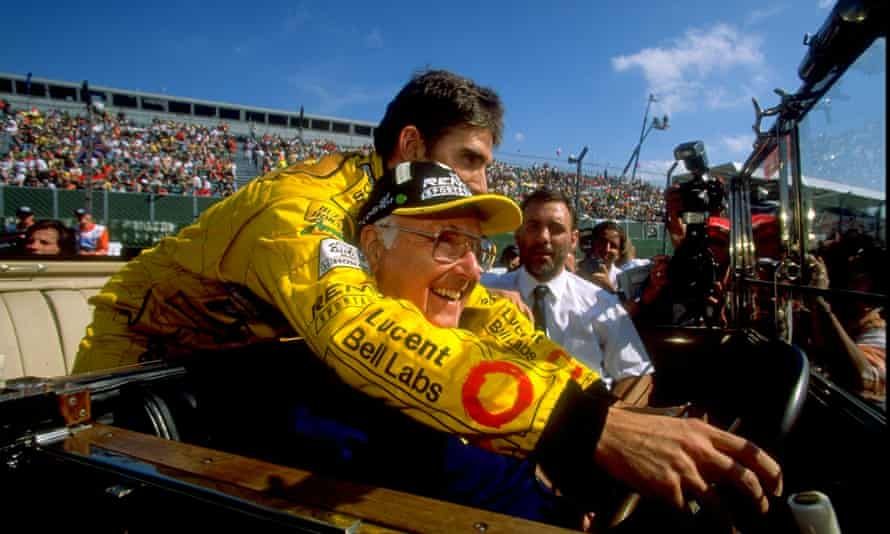 Murray Walker taking the wheel with Damon Hill at the Austrian Formula One Grand Prix in 1999.