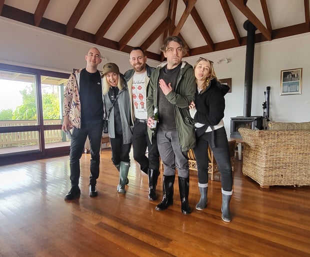 Nathan Jolly (second from right) and his friends before leaving their AirBnB on Saturday.