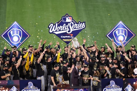 The Brewers celebrate during the trophy presentation after clinching their first World Series title at Tropicana Field on Wednesday.