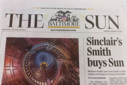 Front page of a news paper, with logo “The Sun” at the top.