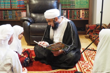Mufti Zeeyad Ravat giving a lesson to his children during Ramadan from his home in Dandenong.