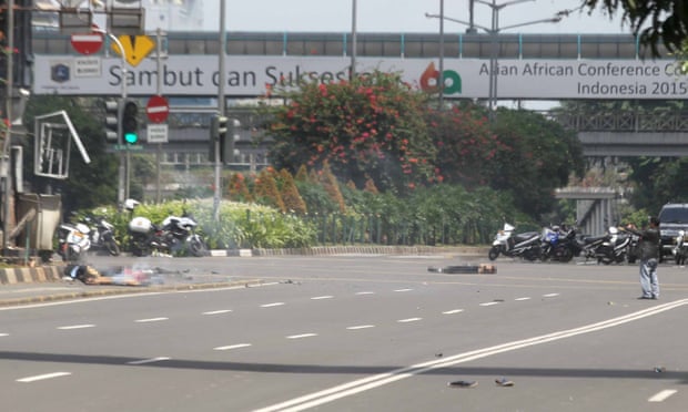 Police chase suspects after a series of blasts hit the Indonesia capital Jakarta.