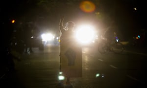 A portester with a Black Lives Matter shield during Satuday night’s demonstrations in Portland