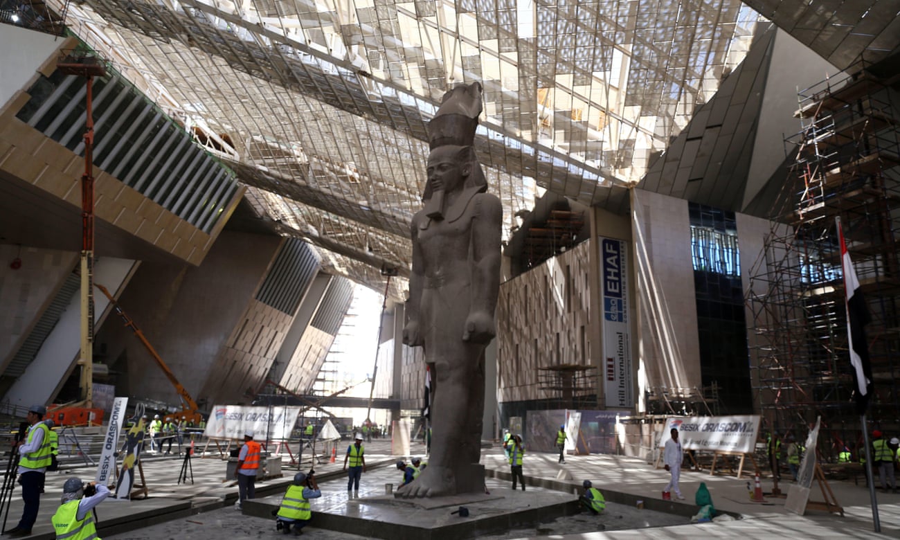 Builders work around the Ramses II statue at the Grand Egyptian Museum, Giza, Cairo, Egypt.