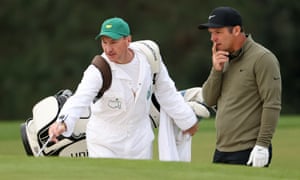 Paul Casey of England talks with his caddie John McLaren.