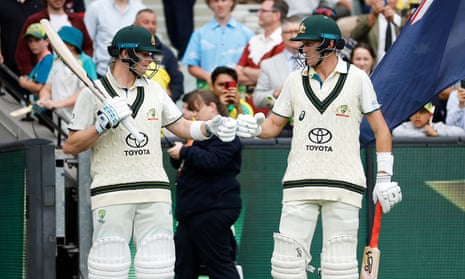 Steve Smith and Marnus Labuschagne of Australia bump gloves before walking out to bat on day one of the Boxing Day Test between Australia and Pakistan