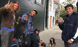 Isaiah Wolfe, aka Orange, second from left, and Sunshine Autrey, right, in Haight-Ashbury.