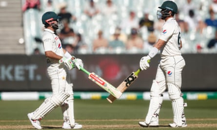 Pakistan's Mohammad Rizwan and Salman Ali Agha bat with bat during fourth day of Boxing Day Test