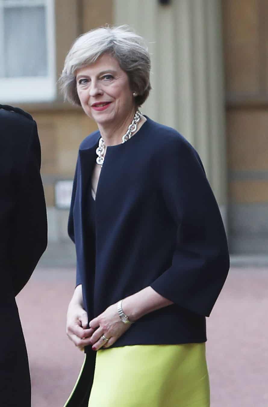 Theresa May leaves Buckingham Palace after an audience with the queen.