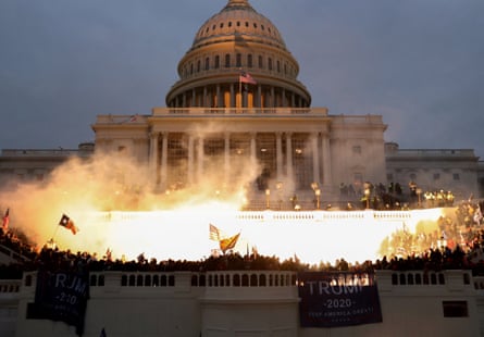 Capitol building with a fire burning in front of it