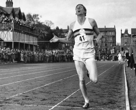 British athlete Roger Bannister breaks the tape to become the first man ever to break the four minute barrier in the mile at Iffly Field in Oxford
