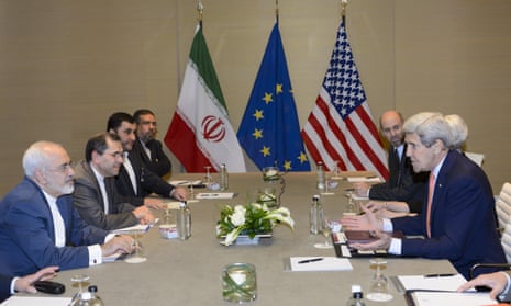 John Kerry, right, speaks with Iranian foreign minister Mohammad Javad Zarif, left