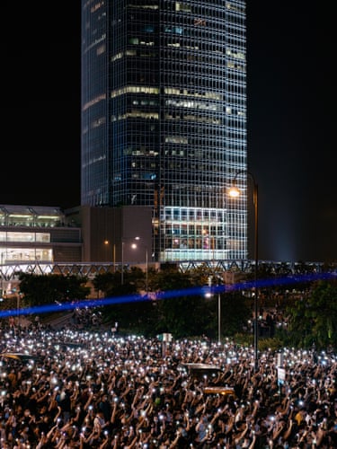 Edinburgh Place, Hong Kong, 2019 anti-government protesters raise their phons