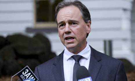 Greg Hunt speaks to the media during a press conference