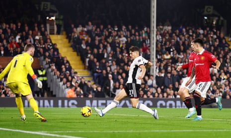 Fulham's Daniel James scores their first goal.