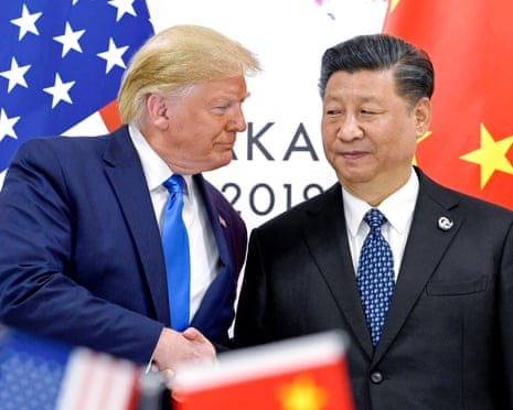 2019 年 6 月 29 日,唐納德·川普在大阪 G20 峰會上與習近平握手。