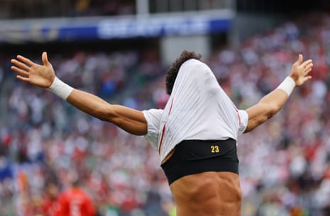 Ramin Rezaeian celebrates
