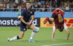 Scotland’s Adam Hastings, left, reacts as Russia’s German Davydov falls over after his last minute try was disallowed.