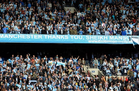 The crowd celebrate City’s 2012 title victory around the banner thanking Sheikh Mansour.