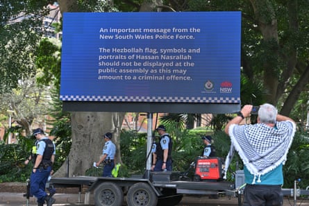 A sign warning against displaying the Hezbollah flag