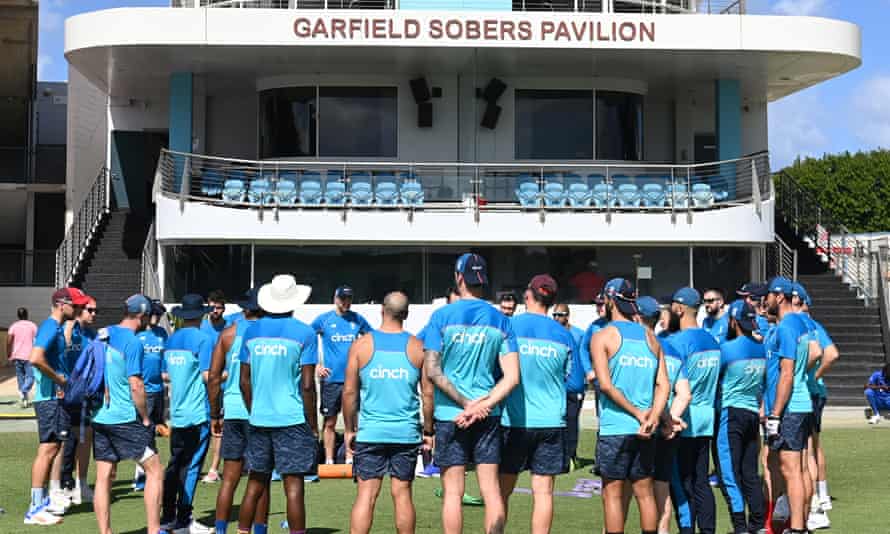 England’s players in a huddle before a nets session at Kensington Oval