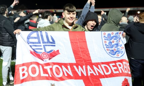 Bolton fans celebrate the semi-final win at Accrington.