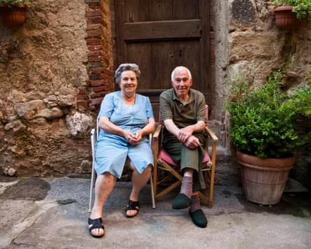 Outdoor portrait of senior couple.