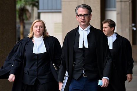 Nicholas Owens (centre), barrister for the Age, Federal Capital Press and Fairfax Media, outside the federal court in Sydney in April