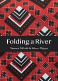 A book jacket with a pattern of squares in red, black and white.