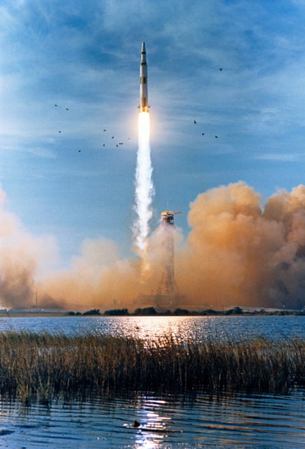 The Saturn V rocket carrying the Apollo 8 crew launches in 1968 in Florida. The mission was the first human spaceflight to reach the moon.