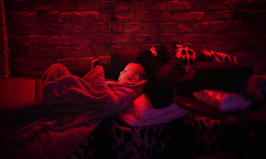 Fear, darkness and newborn babies: inside Ukraine’s underground shelters 2 Svyatoslav, 6, plays with his tablet in a public basement used as a bomb shelter.