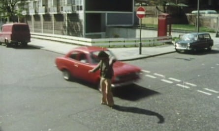 Fred Mumford narrowly avoids a speeding car in the opening scene of Rentaghost
