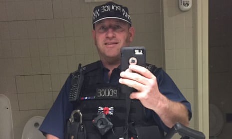 David Carrick taking a selfie in his police uniform.