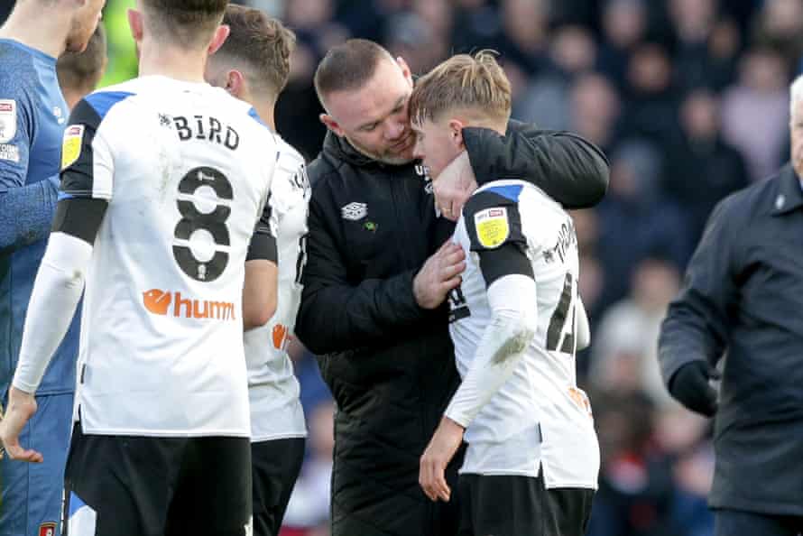 Wayne Rooney with Liam Thompson after Derby’s win.