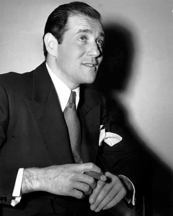 Casting a long shadow … Benjamin ‘Bugsy’ Siegel poses after his arrest in Los Angeles in 1941.