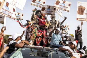 Dakar, SenegalSupporters of the coalition of the president of Senegal, Macky Sall, carry placards of their candidates during the final campaign rally in Dakar.