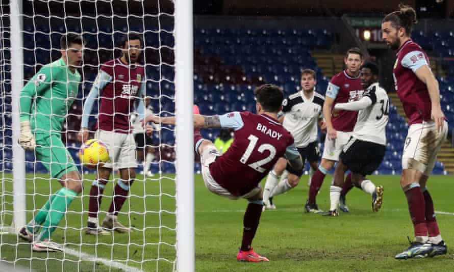 urnley’s Robbie Brady fails to clear off the line as Fulham’s Ola Aina (second right) scores the opening goal.