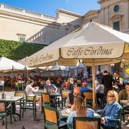 Tourists at the Cafe Cordina, Valletta, Malta.