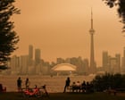 Wildfire smoke engulfs Toronto as unhealthy air reaches New York - video